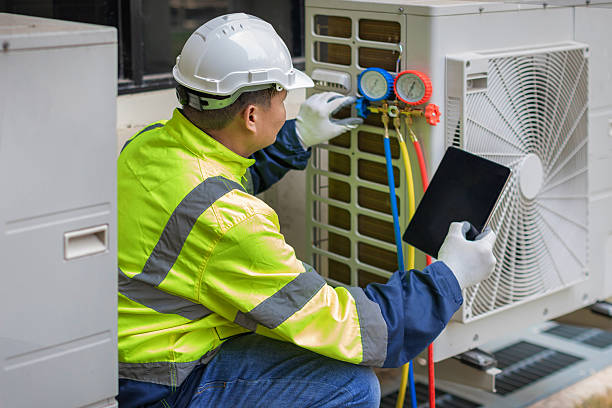 Professional Air Conditioning Repair technician working in Cutchogue, NY